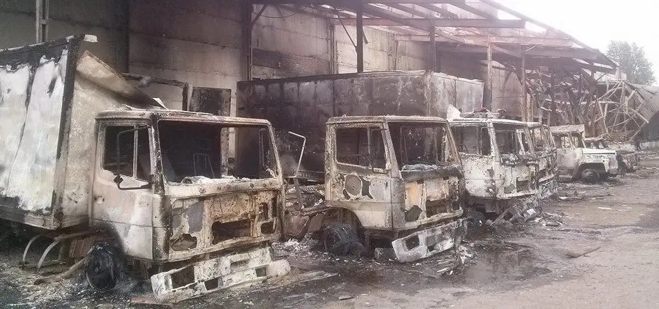 Burned trucks, conflict zone Ukraine 2014